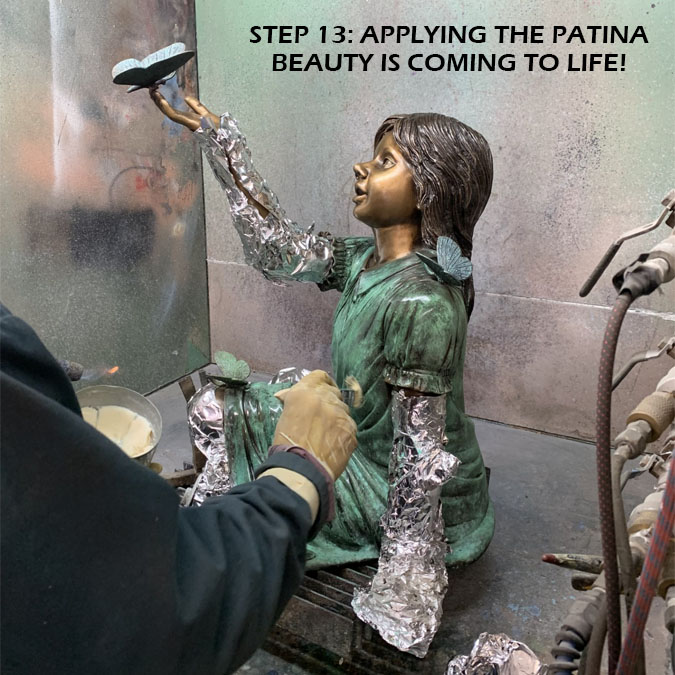 final patina application on statue