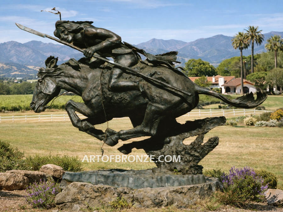 The Cheyenne bronze sculpture after Frederic Remington featuring warrior on galloping horse